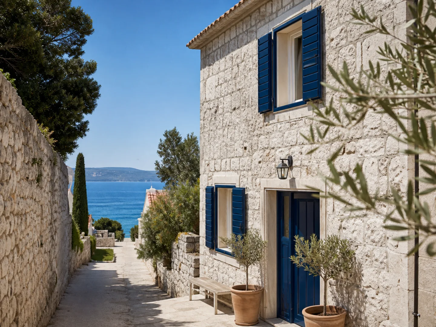 Dalmatian stone accommodation with blue shutters near the sea