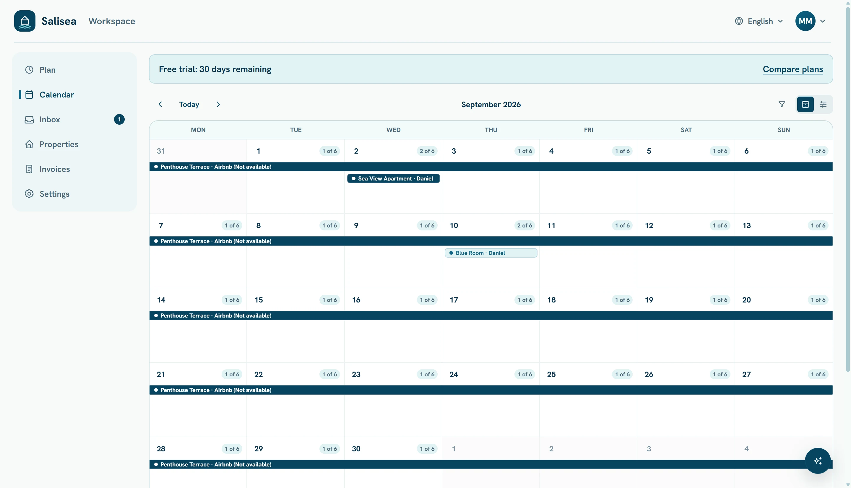 The monthly calendar with confirmed stays, blocks, and imported availability
